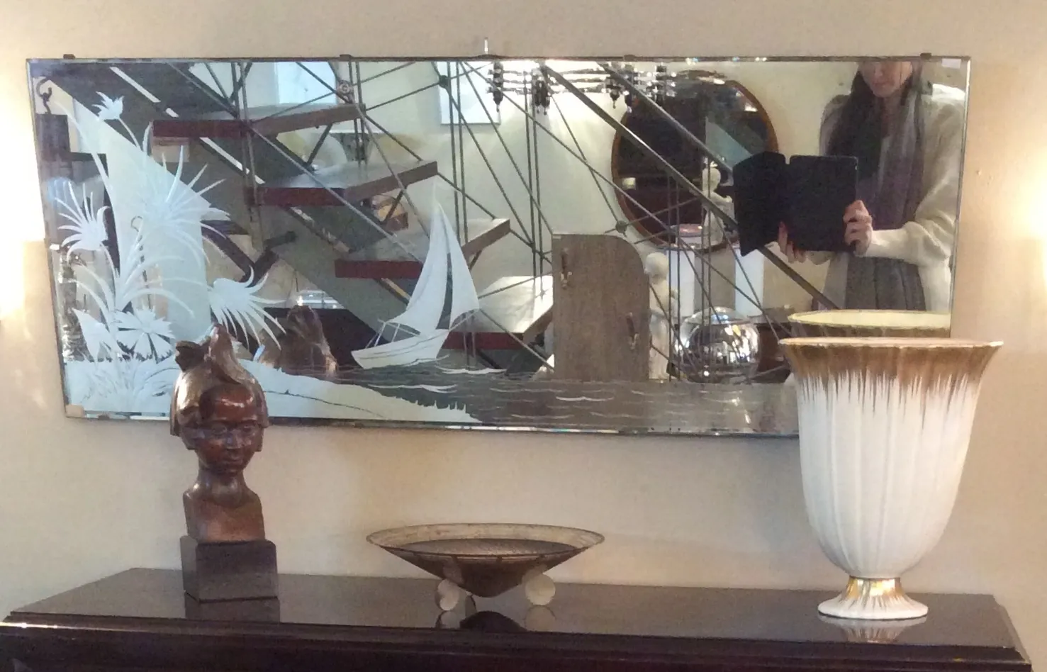 antique bust sculpture on a decorative table