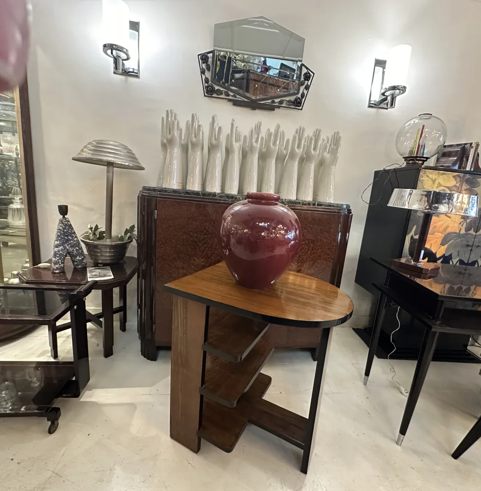 Antique decorative ceramic on table, burgundy color