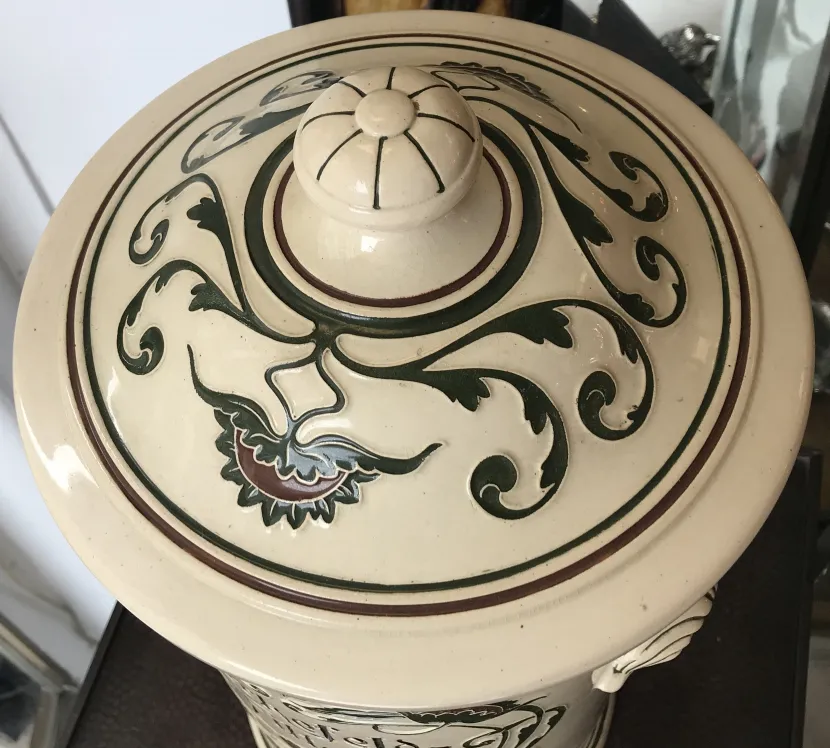 decorative lid of antique ceramic with floral design