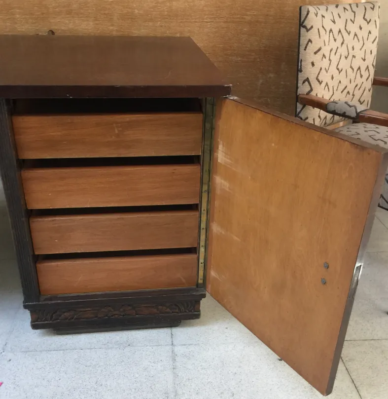 Antique desk with smooth top and five drawers