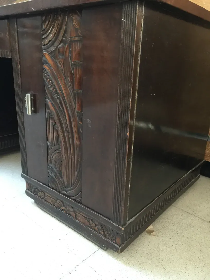 antique desk with carved details, classic ambiance