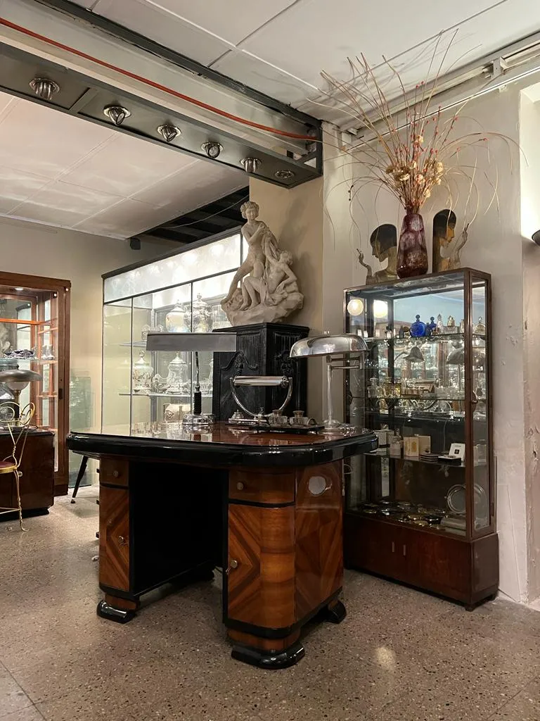 Antique desk with a glossy surface and decorative elements