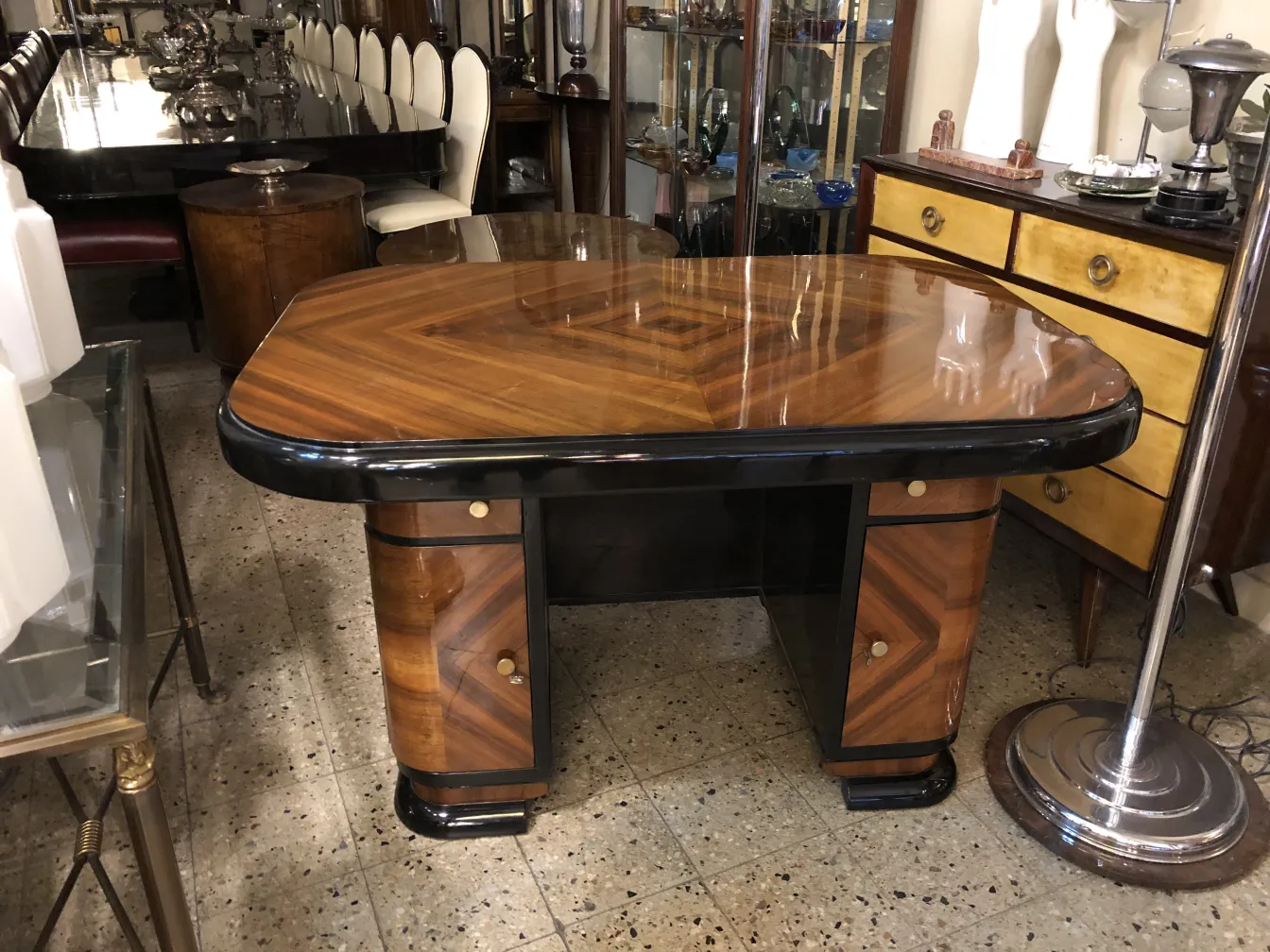 antique desk with a glossy finish and black details