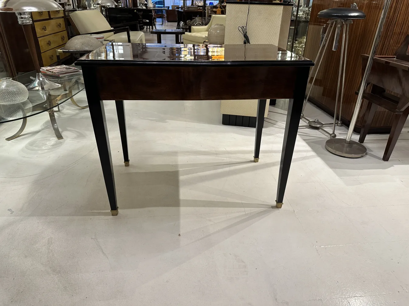 antique desk with a shiny surface in an elegant setting