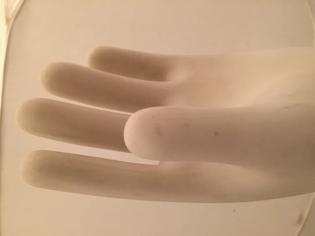 Antique ceramic hand, elegant and decorative, white color.