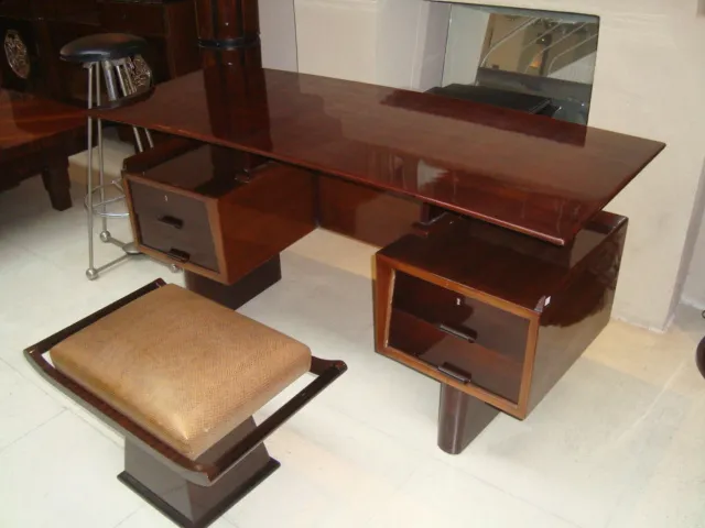 antique desk with glossy surface and two drawers, accompanied by a stool
