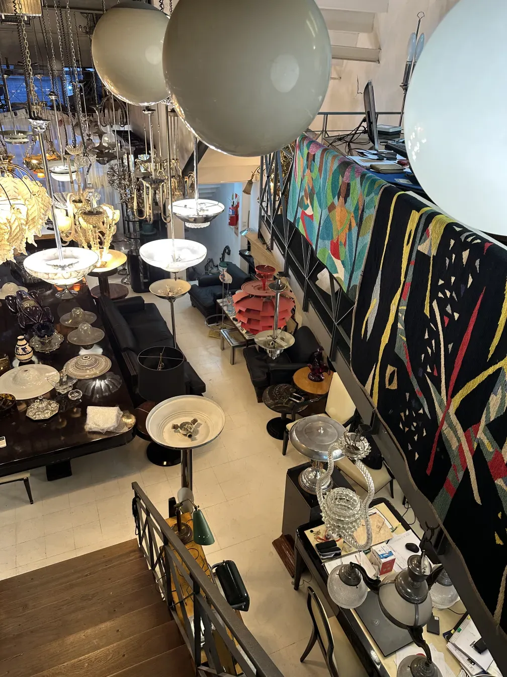 Five antique hanging lamps illuminating a cozy environment.