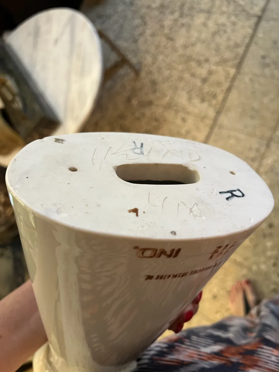 Base of antique ceramic with visible inscriptions, decorative items