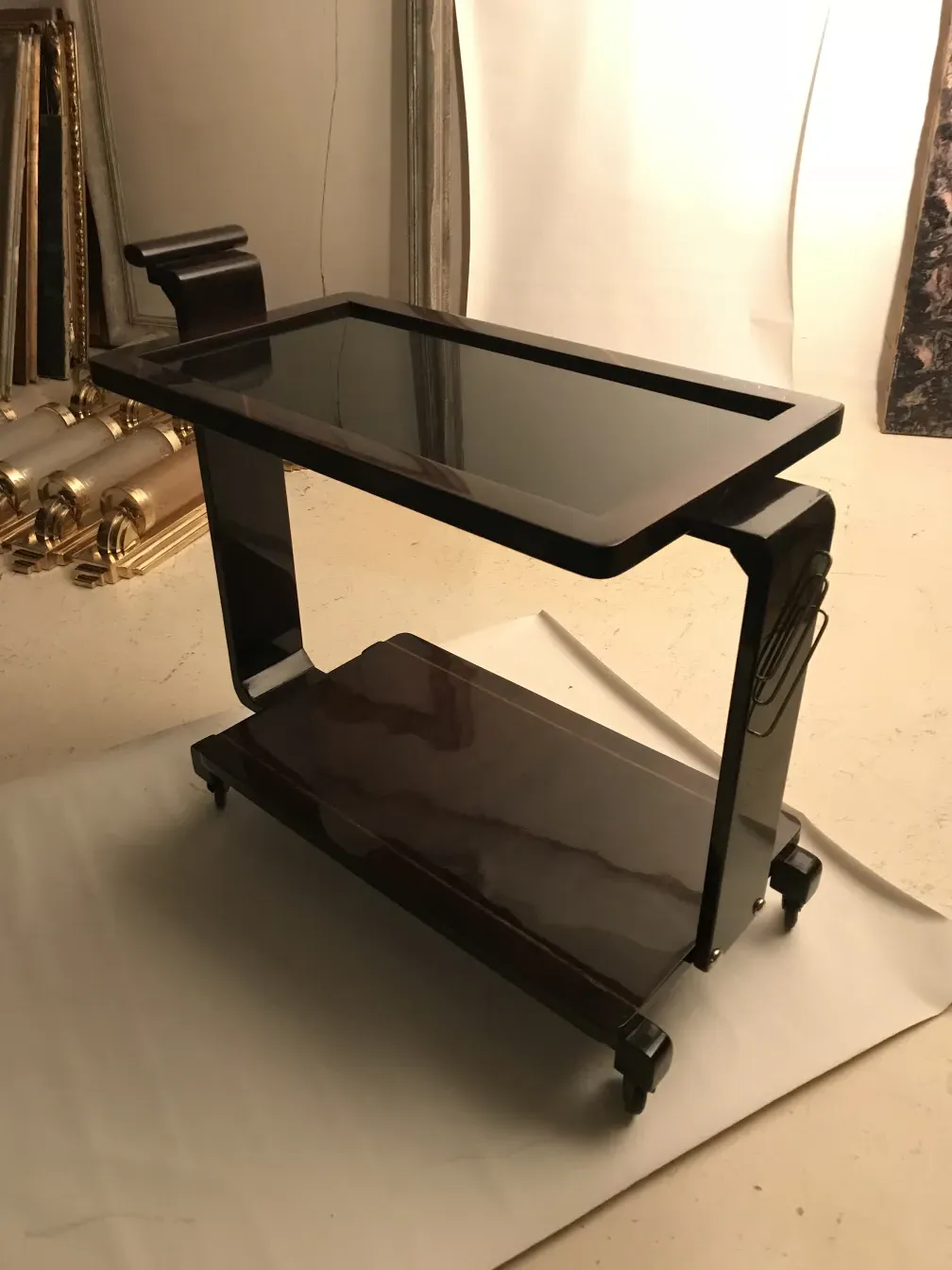 Antique cocktail trolley with wheels in an elegant setting