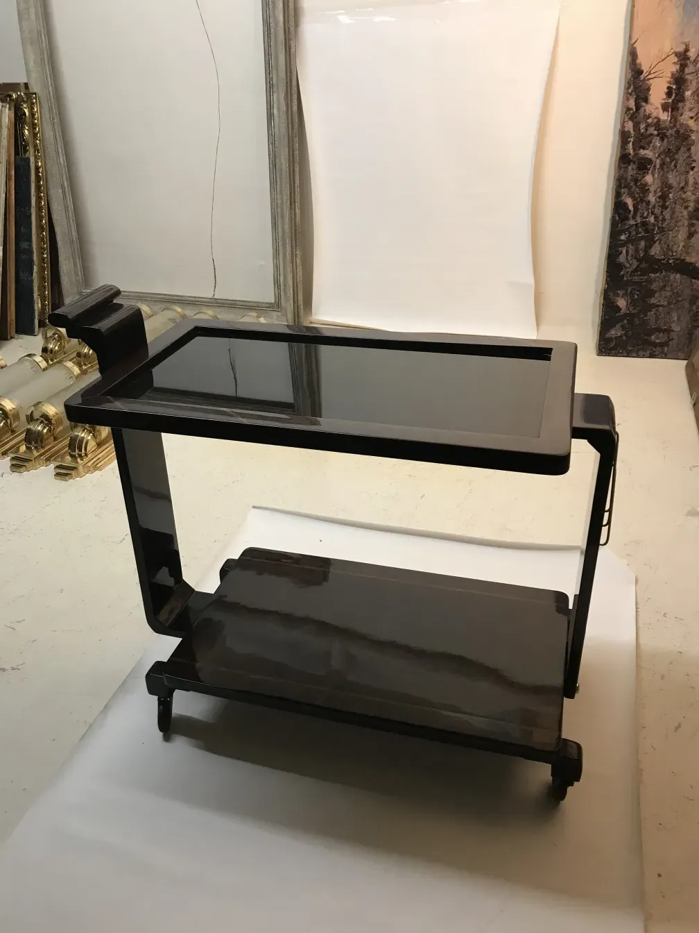 Antique black cocktail trolley, stylish and functional.
