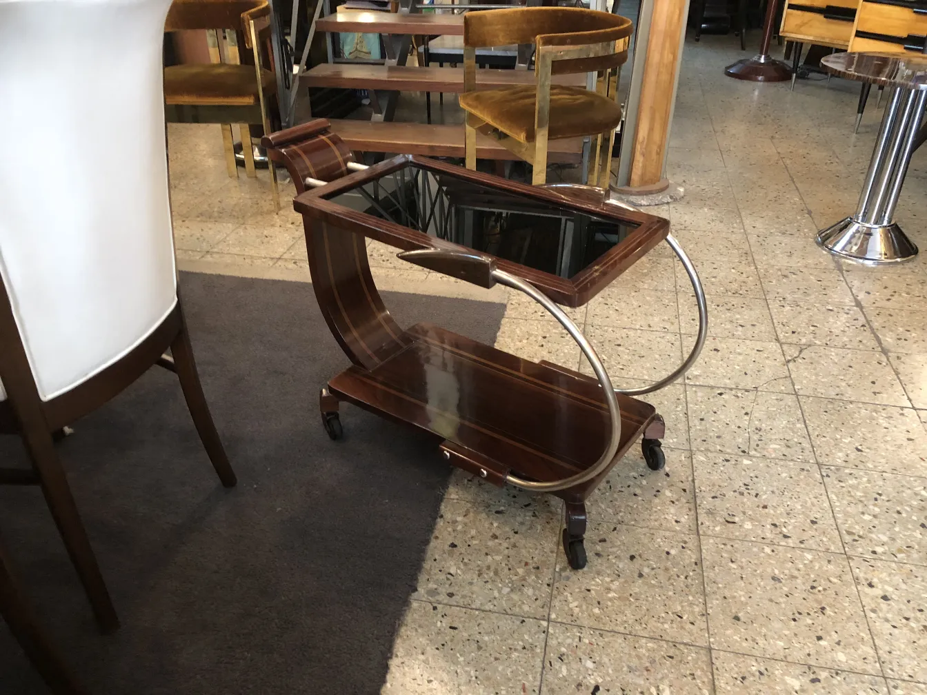Antique cocktail trolley with elegant design and wheels
