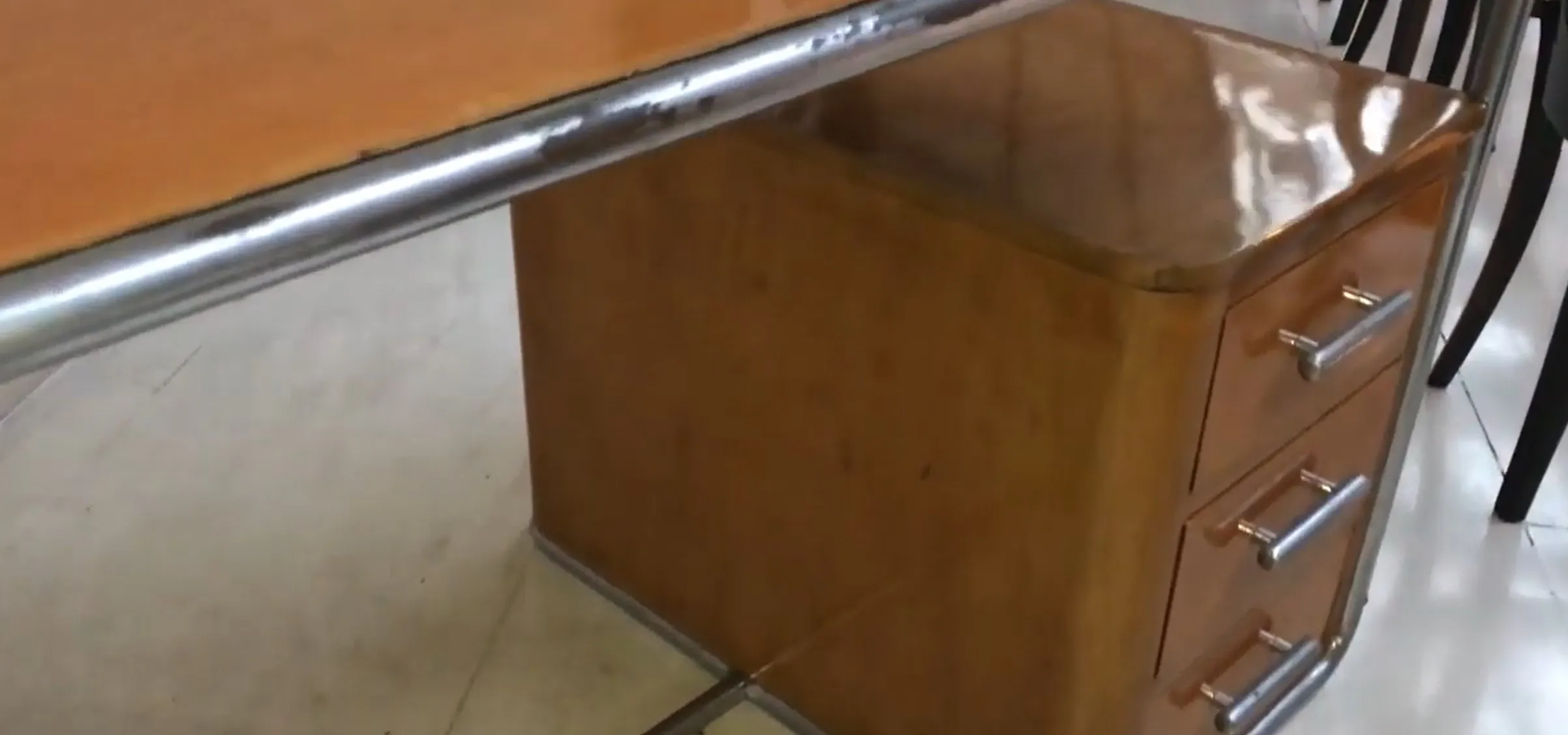 antique desk with clean lines and drawers