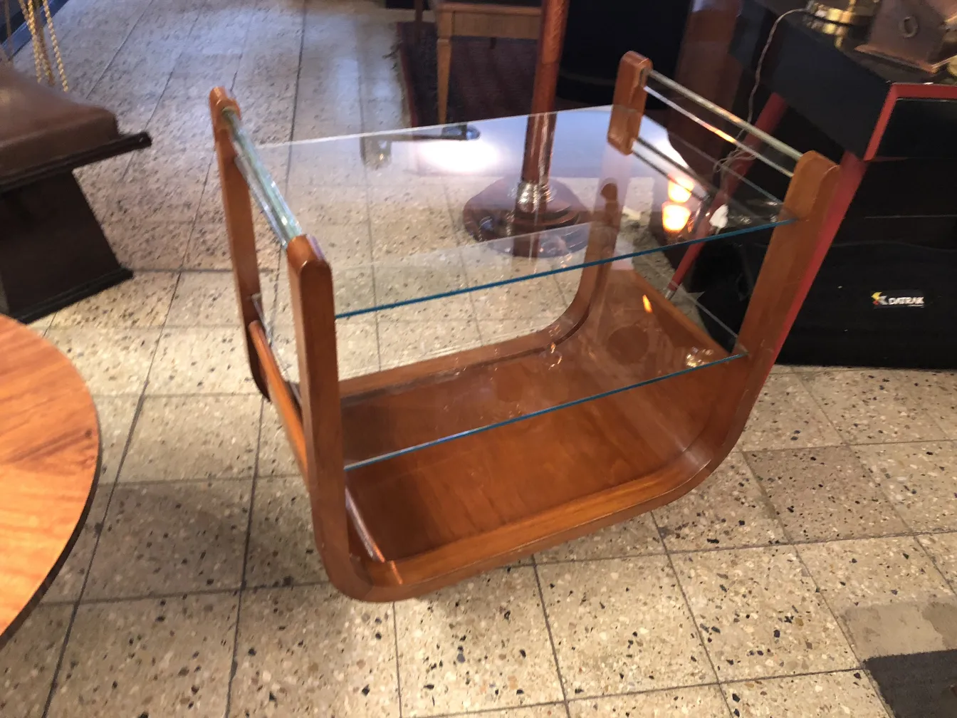 Antique wooden cocktail trolley with glass shelves