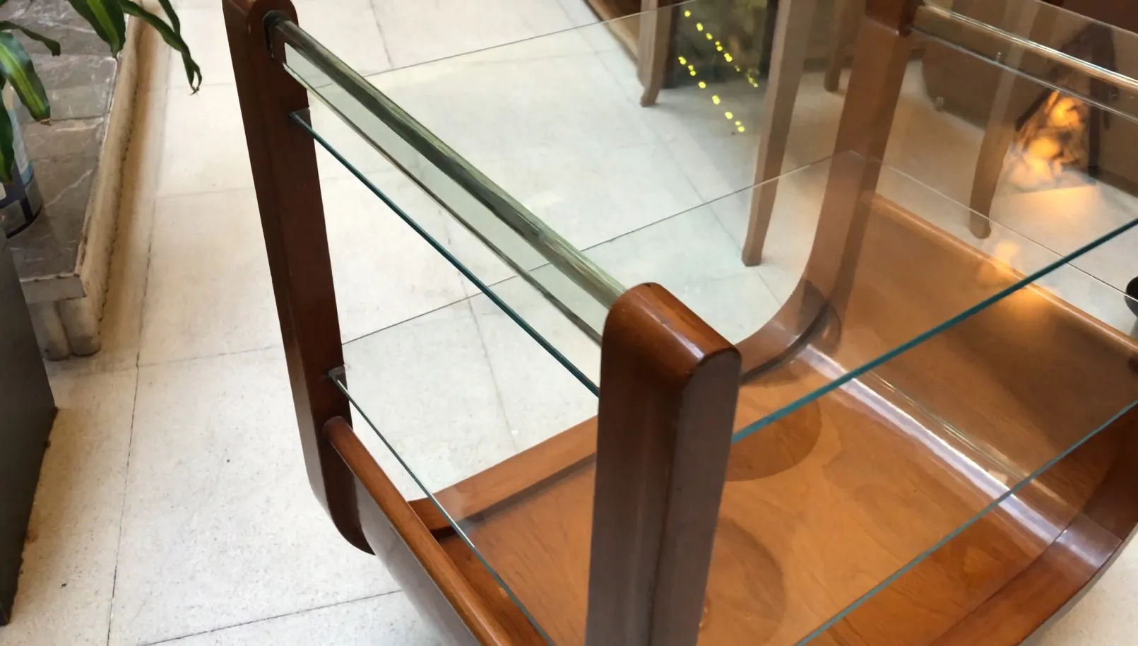 Antique cocktail trolley with stylish design and glass shelves