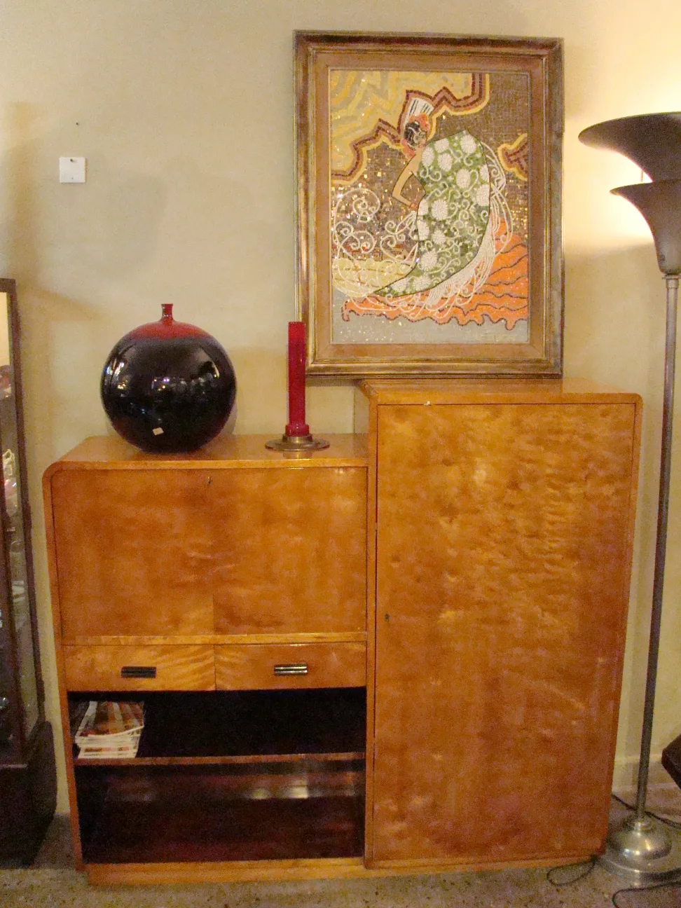 Antique desk with light wood finish and storage space