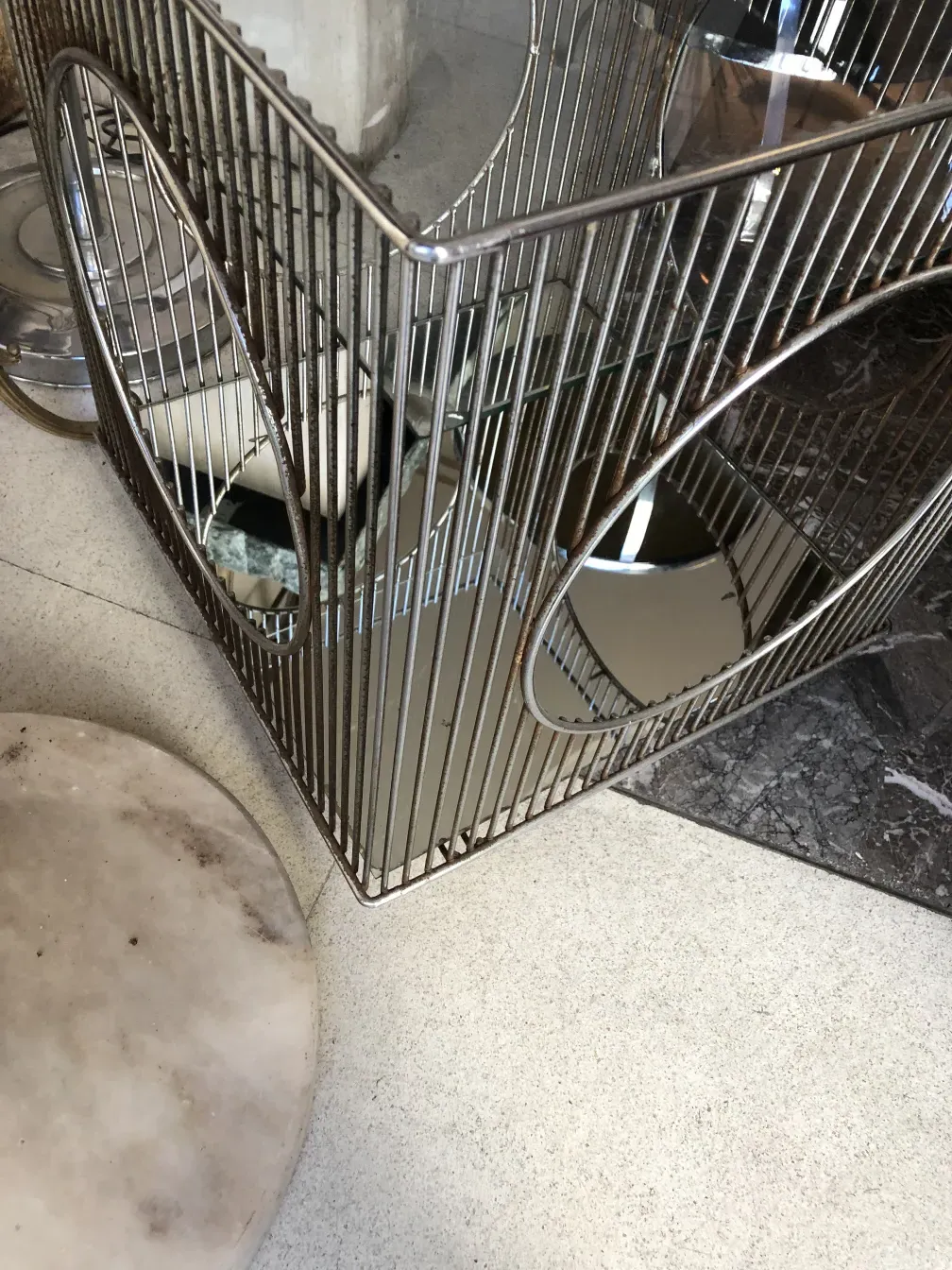 Antique cocktail trolley with Warren Platner design and mirrors.
