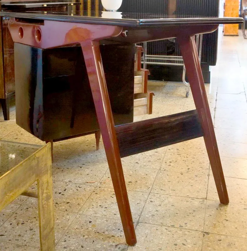 Antique desk in a modern setting with a sleek design
