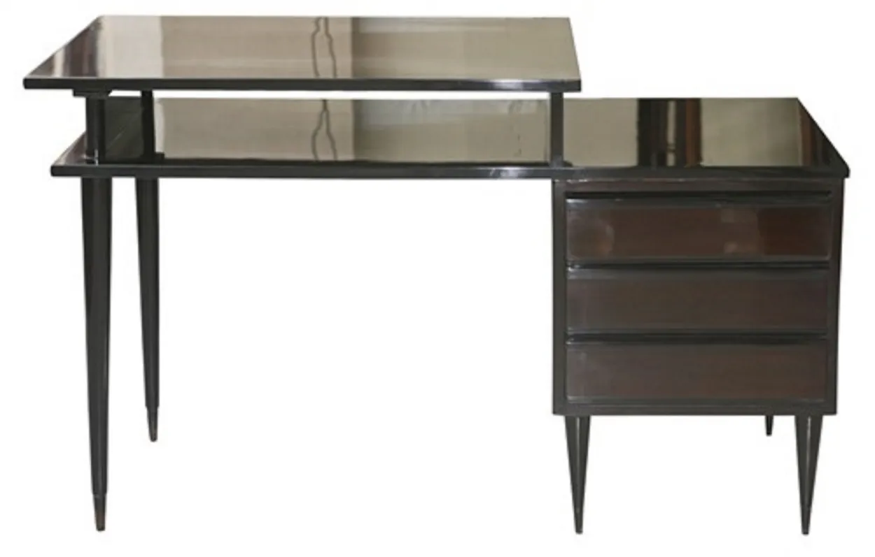 bureau ancien avec finition brillante et pieds inclinés