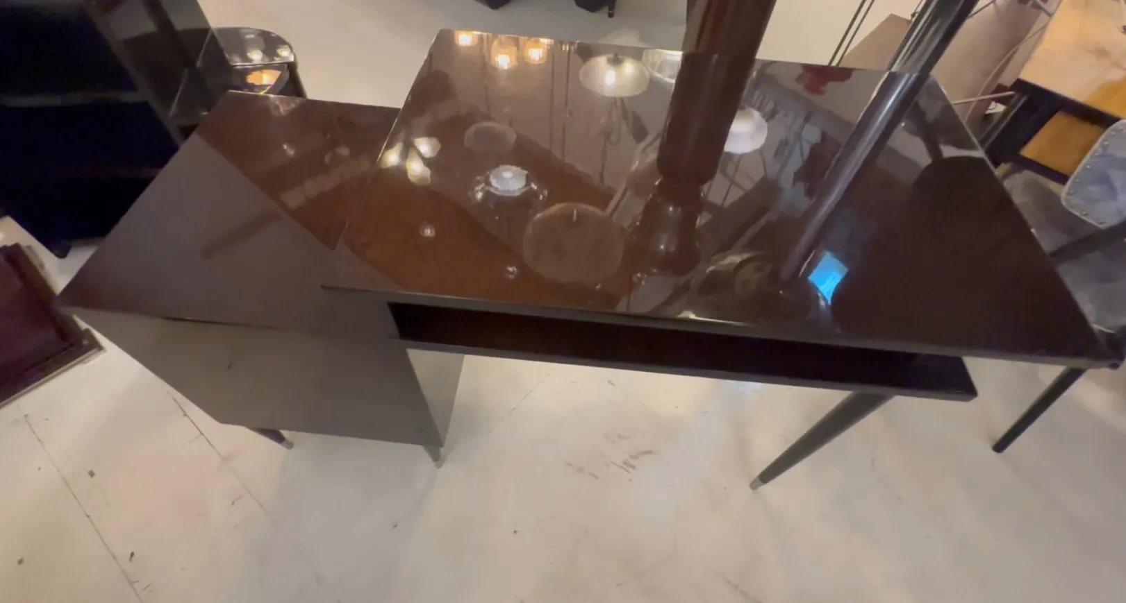 antique black glossy desk featuring an elegant design in a classic setting