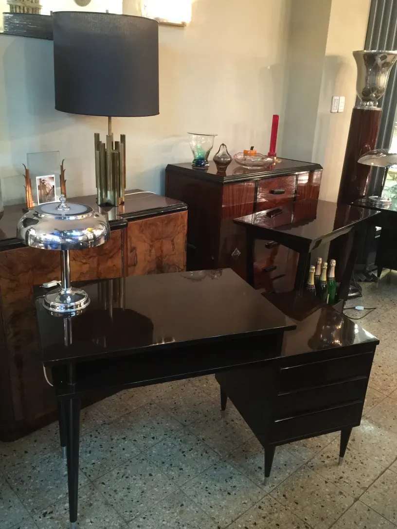 Antique desk with elegant details in a luxury setting.