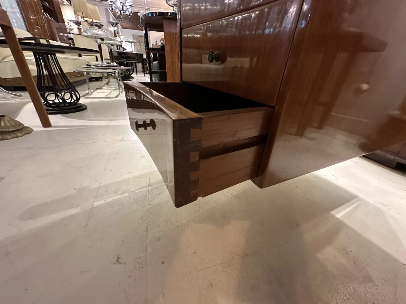 Antique desk with a wood handle and a drawer