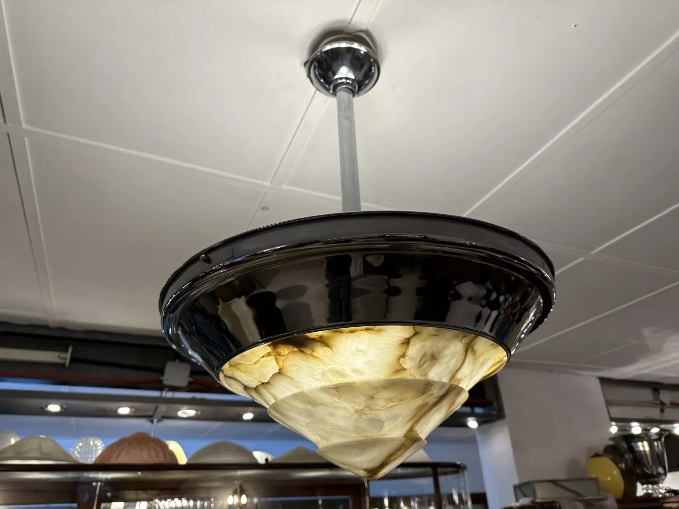 antique hanging lamp with contemporary design in dark tones