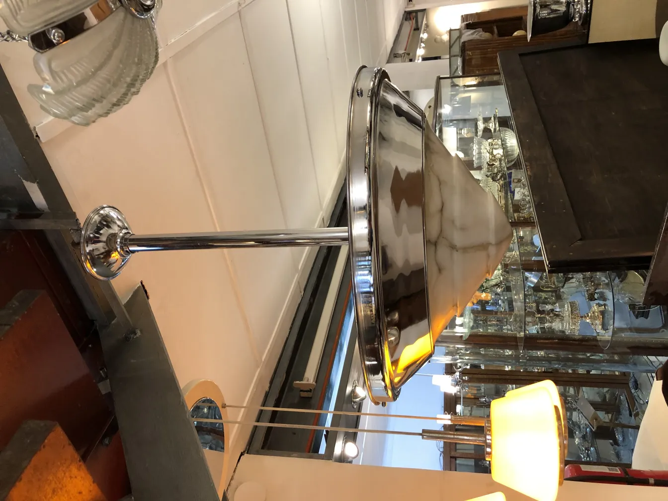 Antique hanging lamp with classic design and shiny finish, elegant ambiance