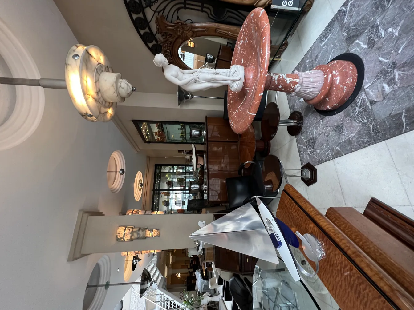 Antique hanging lamp with light and elegant details in a classic setting.