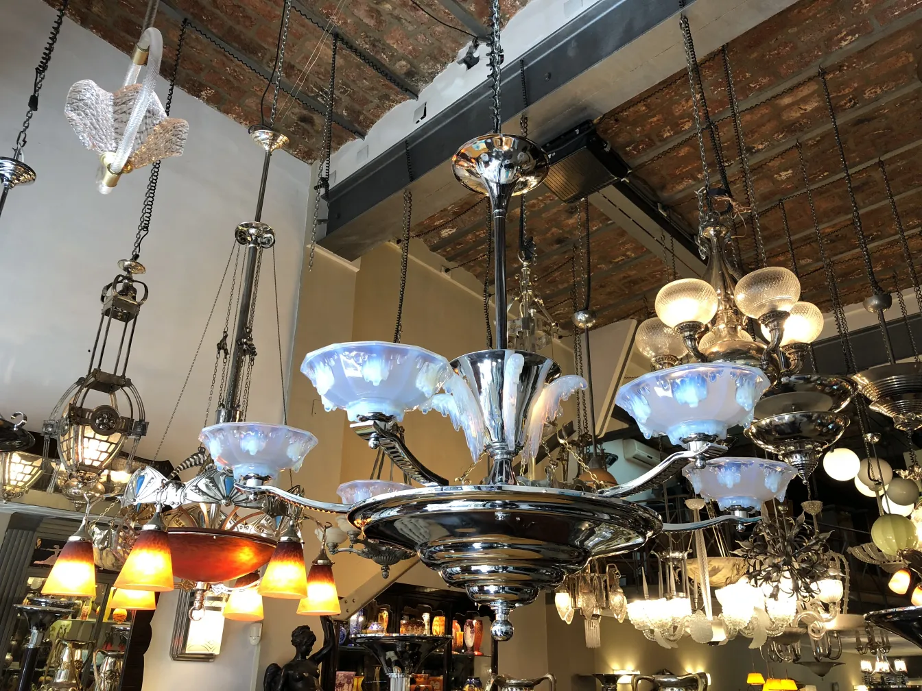 Antique hanging lamp featuring crystal details in an elegant setting.