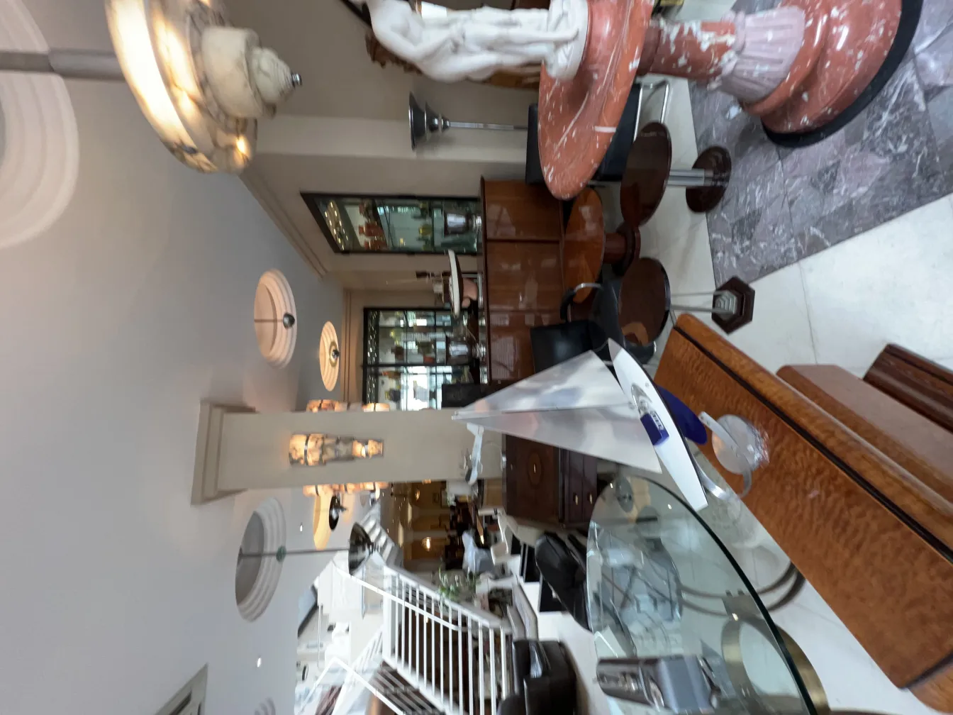 Antique hanging lamp in an elegant setting with vintage furniture.