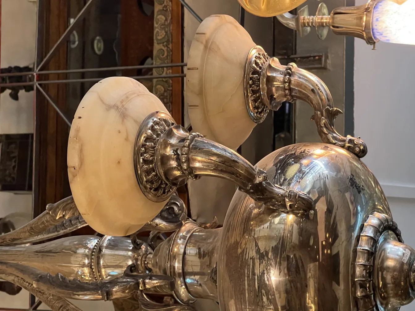 Antique hanging lamp with metal details and warm light