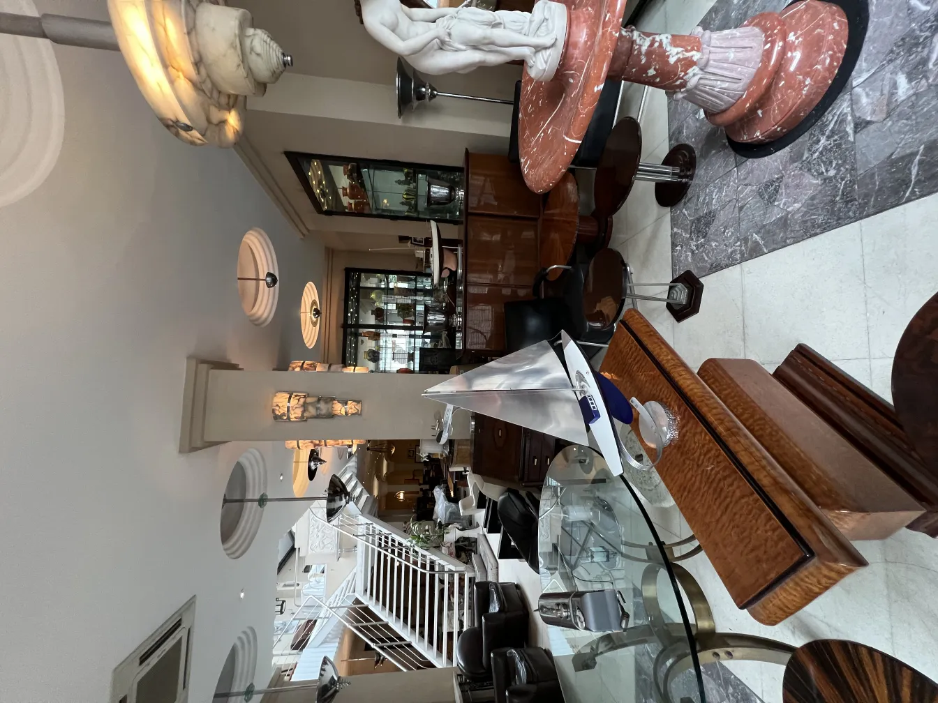 Antique hanging lamp with elegant design in a modern room.