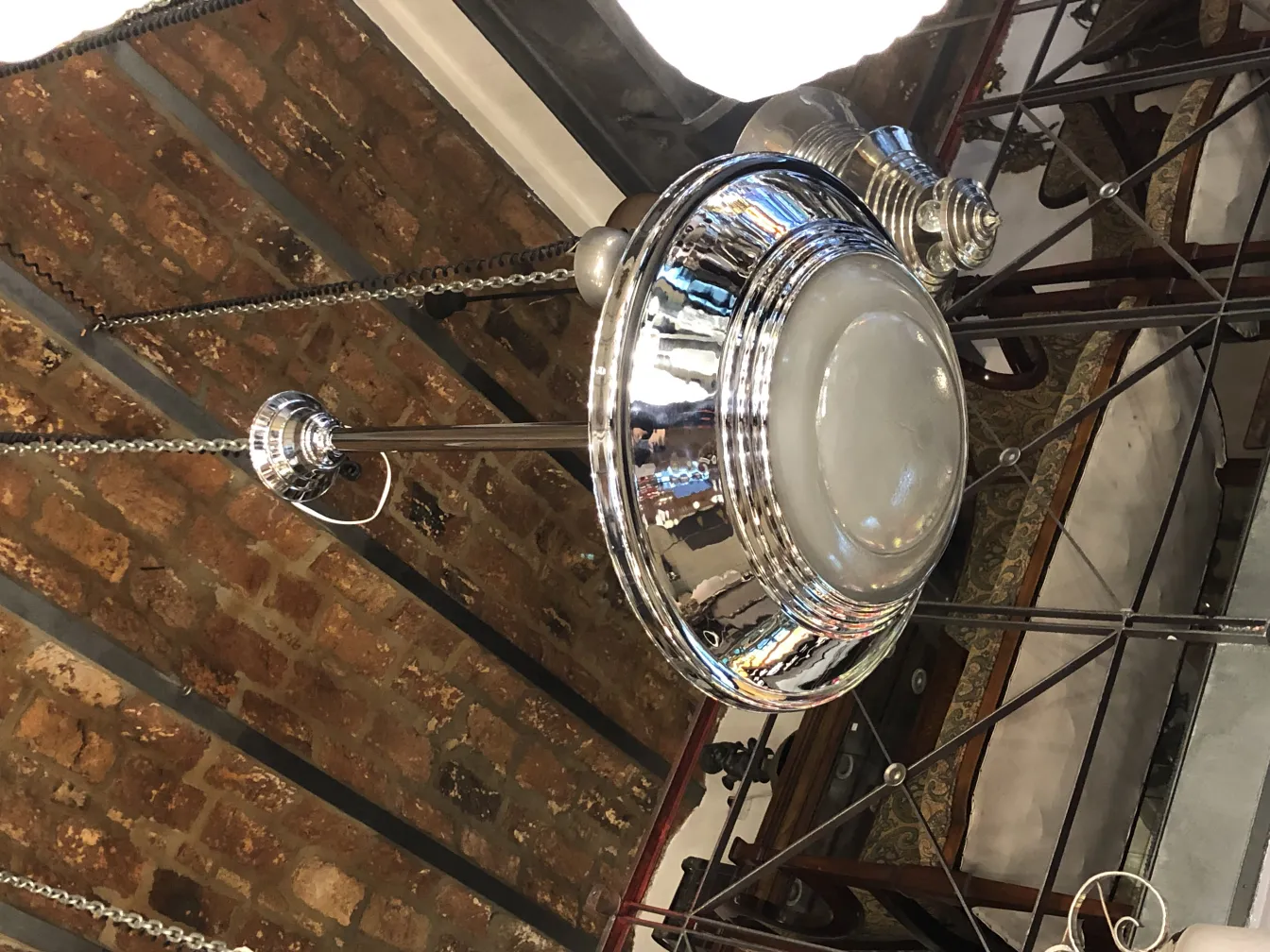 Antique hanging lamp with a shiny and elegant design.