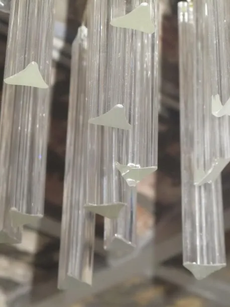 Antique hanging lamp with transparent and elegant design, suspended.