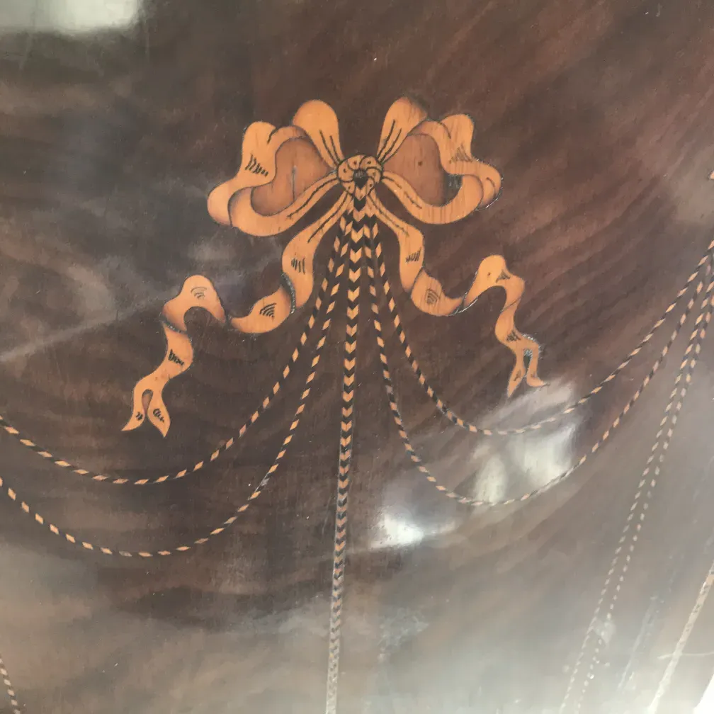 antique desk with floral design on the surface