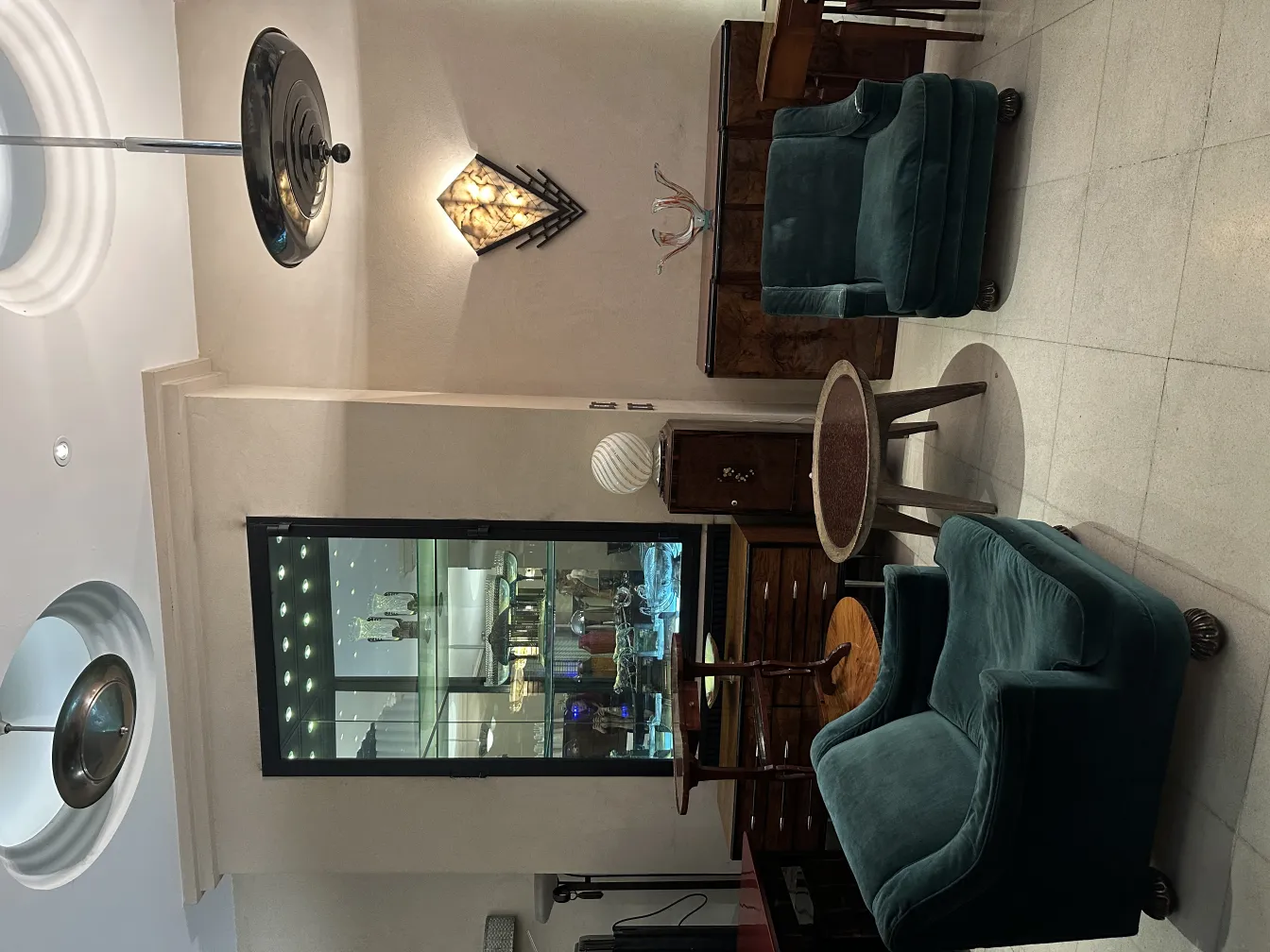 Antique hanging lamp with elegant design, illuminating a cozy environment.