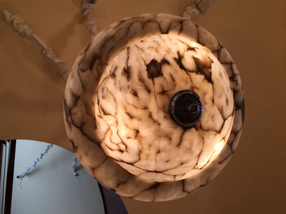 Antique hanging lamp made of ceramic with classic design.