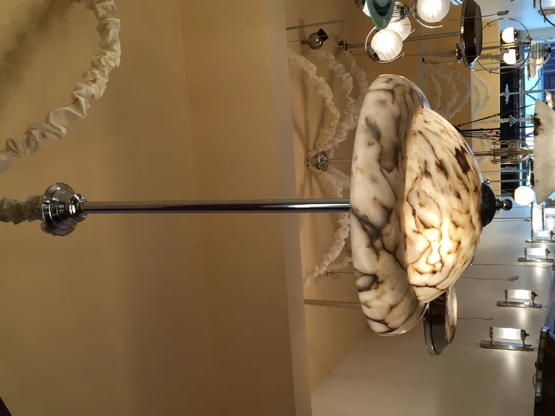 Antique hanging lamp made of marble with a glossy finish.