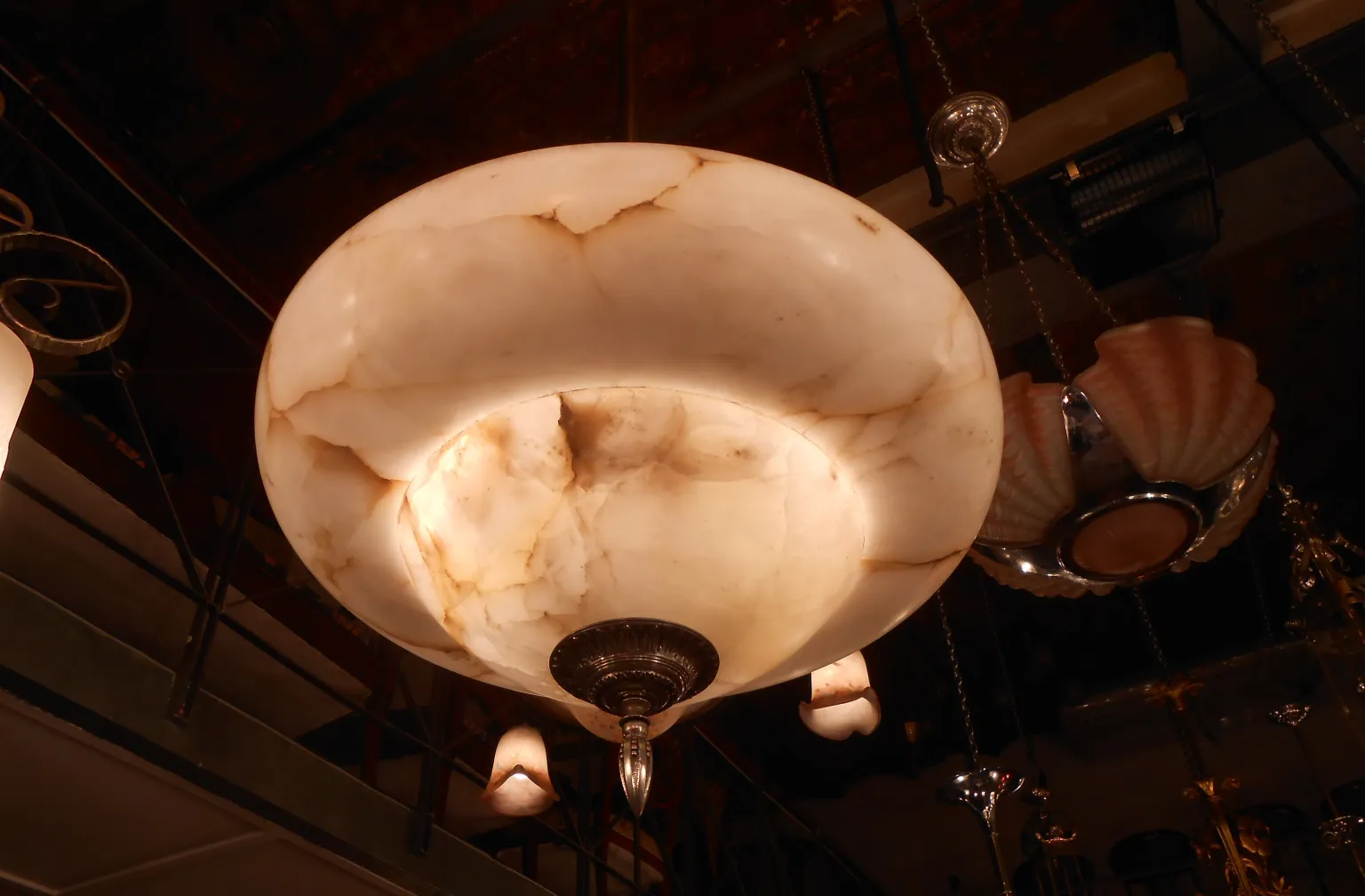 Antique alabaster hanging lamp, decorative and elegant ambiance light.