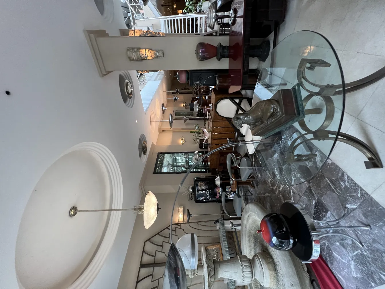 Antique hanging lamp with elegant design in a bright room.