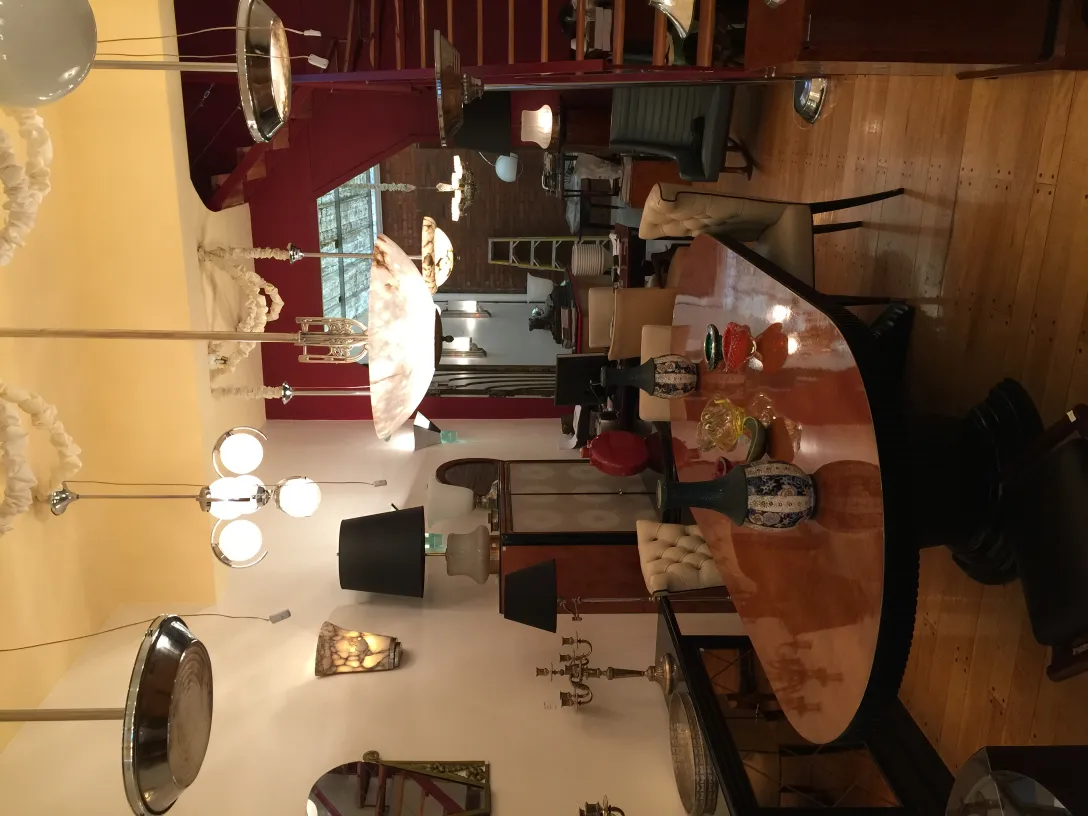 antique hanging lamp with elegant details in a bright dining room