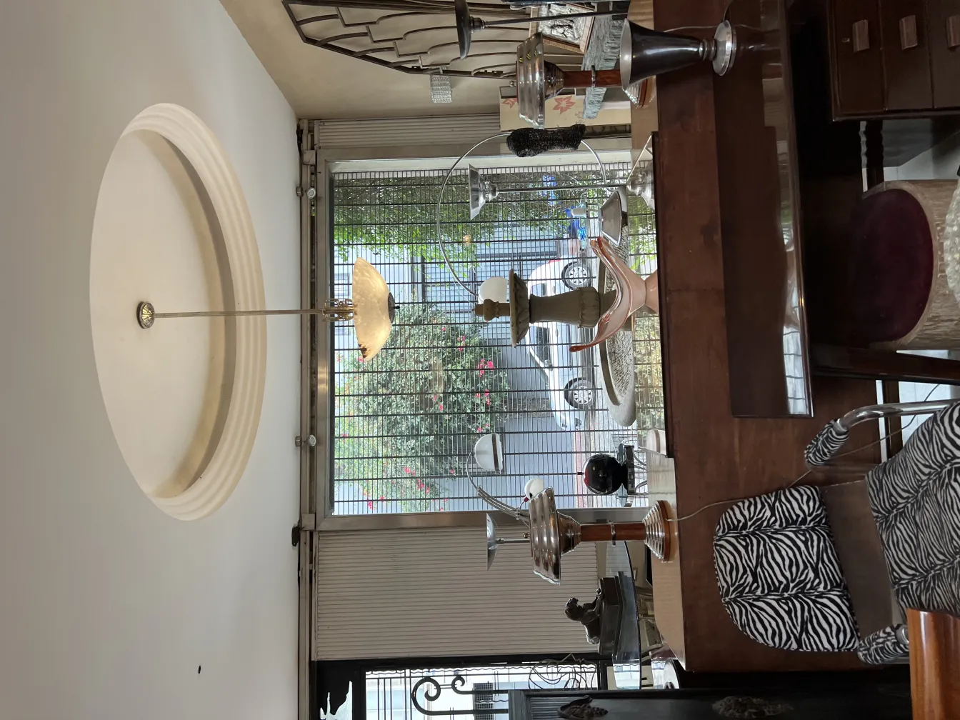 Antique hanging lamp with elegant design in a cozy setting.