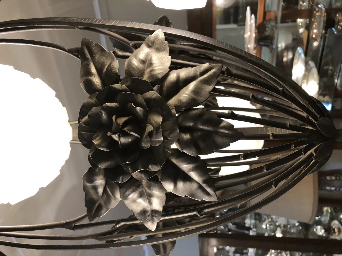 Antique hanging lamp featuring rose design