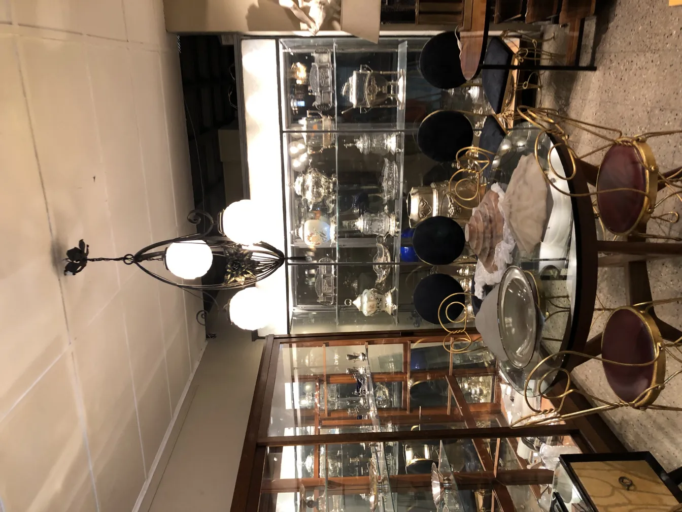 Antique hanging lamp with white spheres, elegant atmosphere