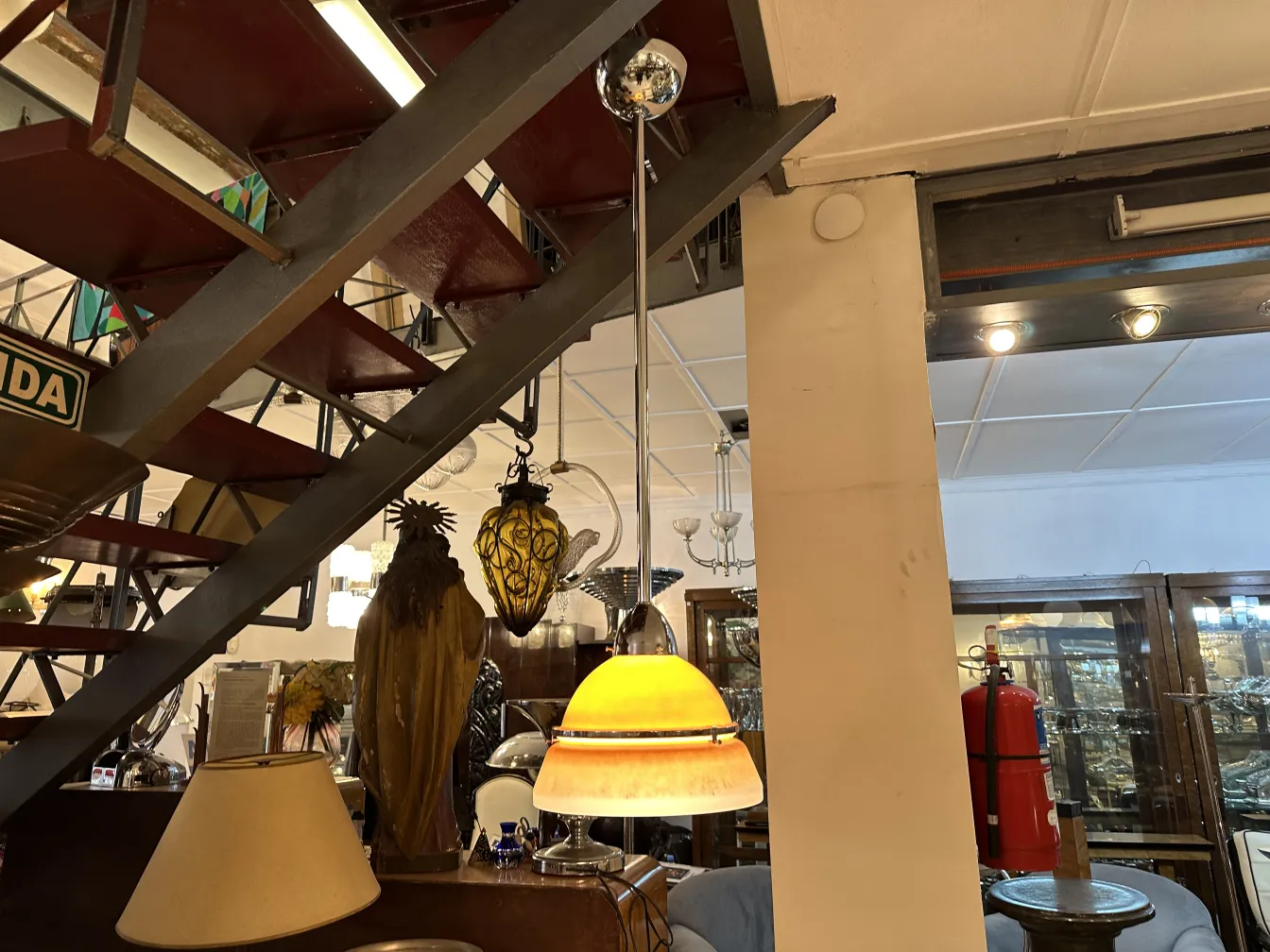 Antique hanging lamp with unique decorative details in a retro atmosphere.