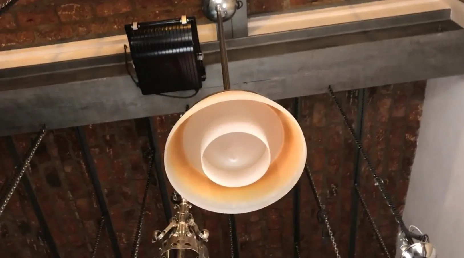 antique hanging lamp featuring unique design, warm atmosphere