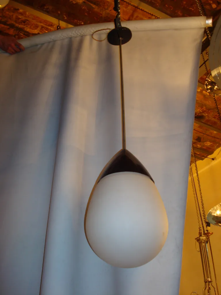 Antique hanging lamp in an oval shape, white color