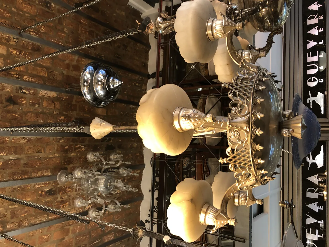Antique hanging lamp with elegant details and chic style, illuminating a cozy environment.