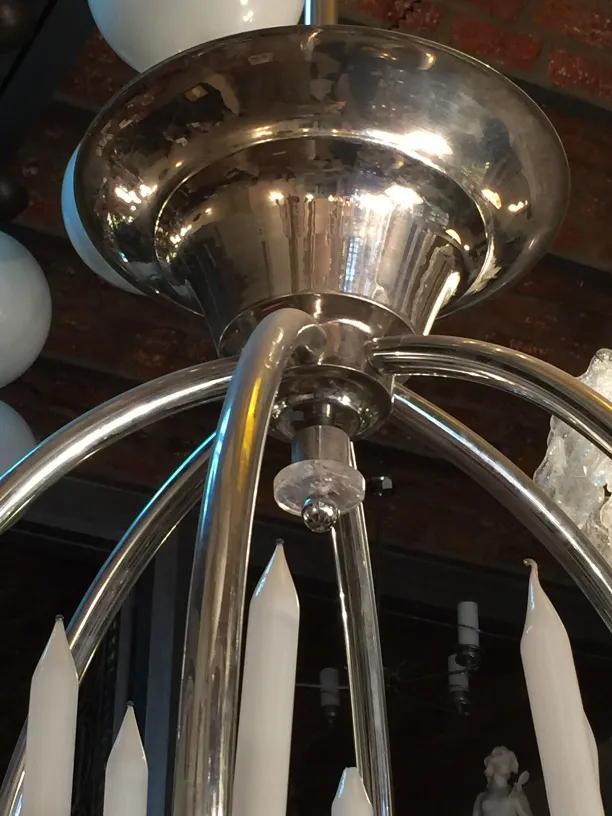 Lampada a sospensione antica con luci bianche a forma di candela e finitura lucente