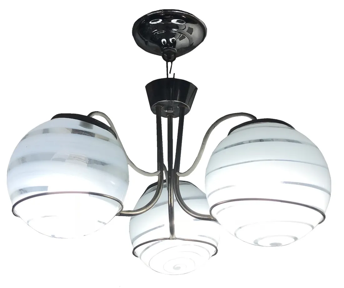 Antique hanging lamp with three white spherical shades and elegant design.